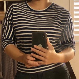 I’m selling a blue striped half long sleeve.